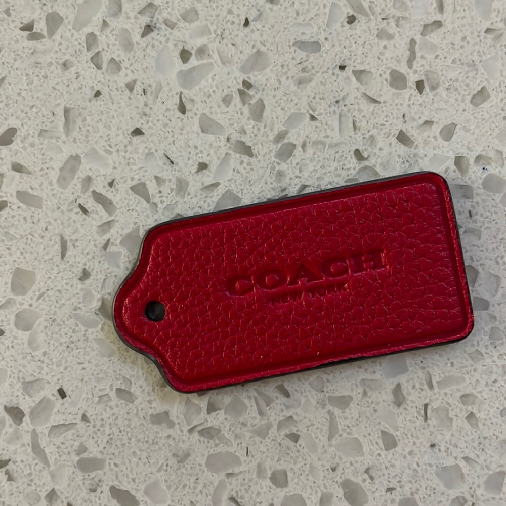 Coach Tag